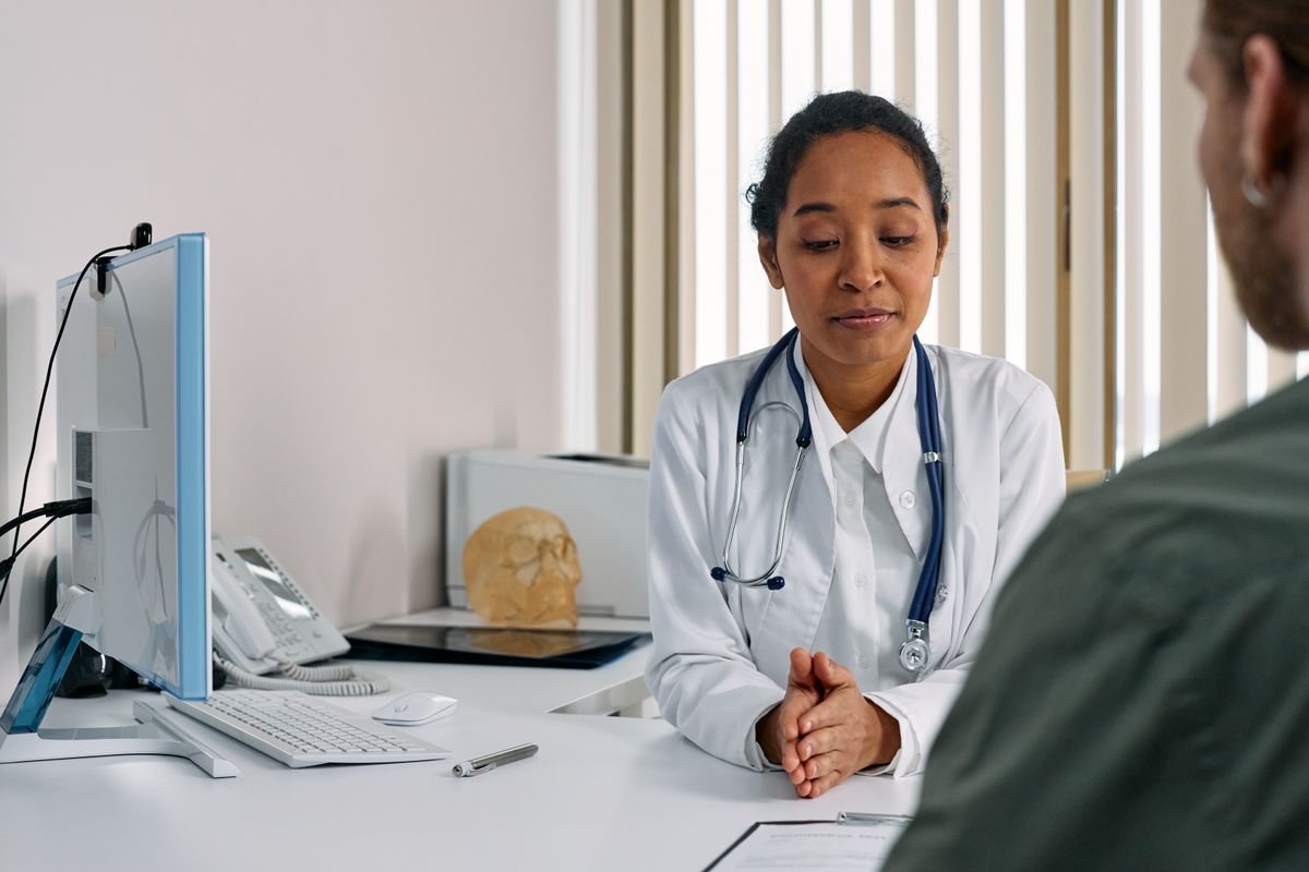 A doctor advising a patient on preventative care